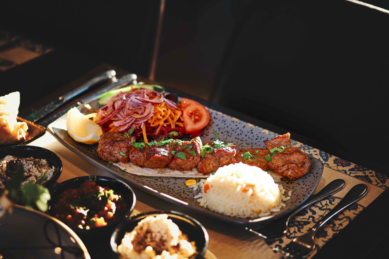 Grilled kebab with rice and meze